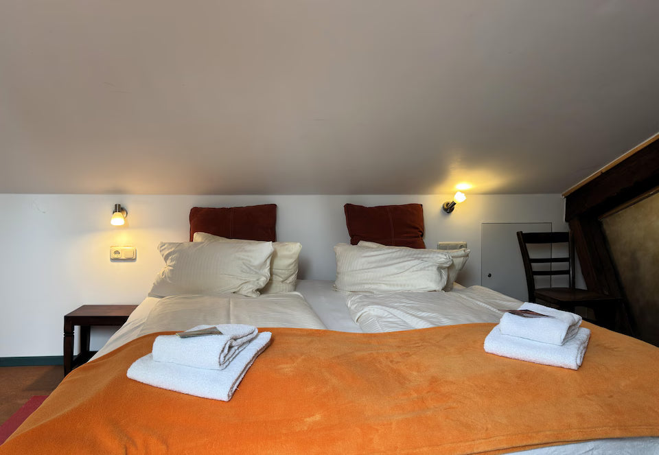 B&C Bett mit Gemeinschaftsbad (Männer)